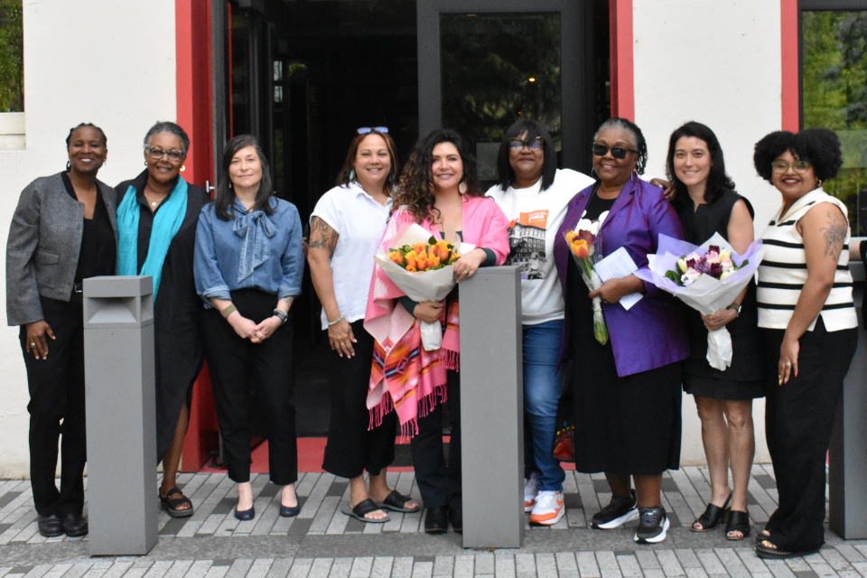 A photo of our Until Justice Just Is speakers and staff lined up together smiling.