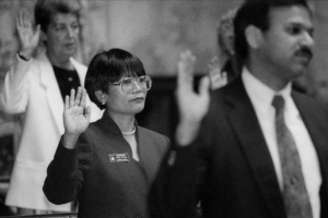 Velma Veloria, the first Asian American woman and the first Filipina American elected to the Washington State Legislature, taking oath of office at the Washington State House of Representatives, Olympia. (January 11, 1993)